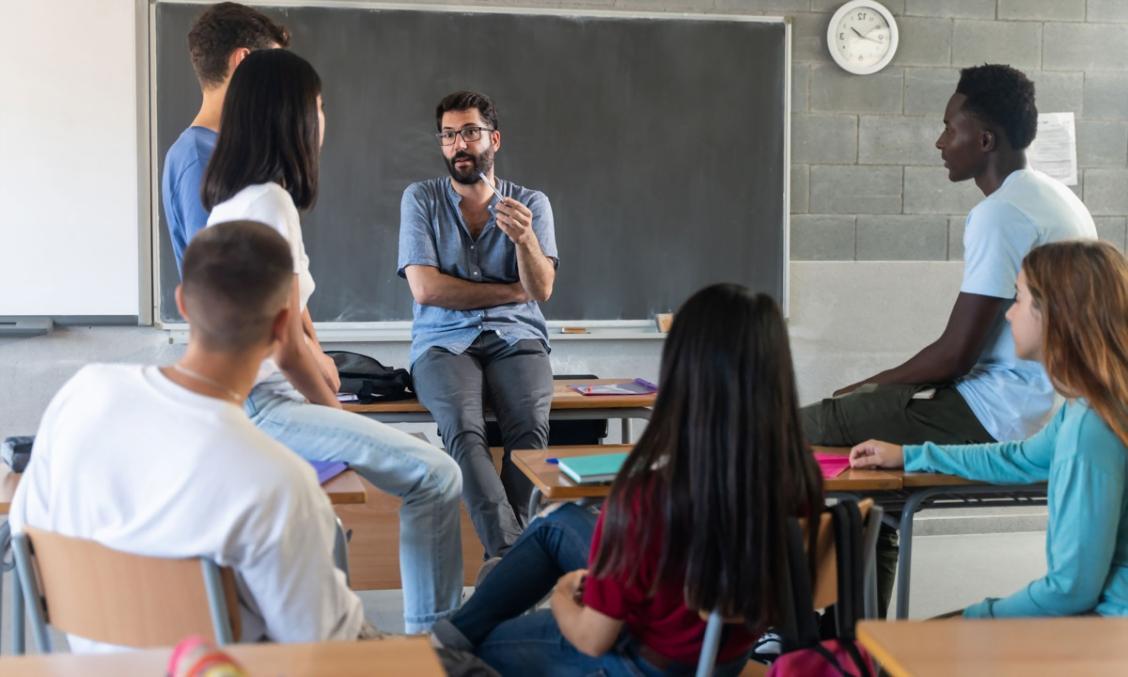 Poetry writing workshop participant working on assignments